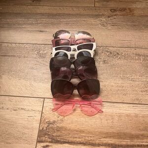 8 pairs of multicoloredered sunglasses